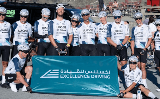 Cycle Against Cancer team with Excellence Driving Center