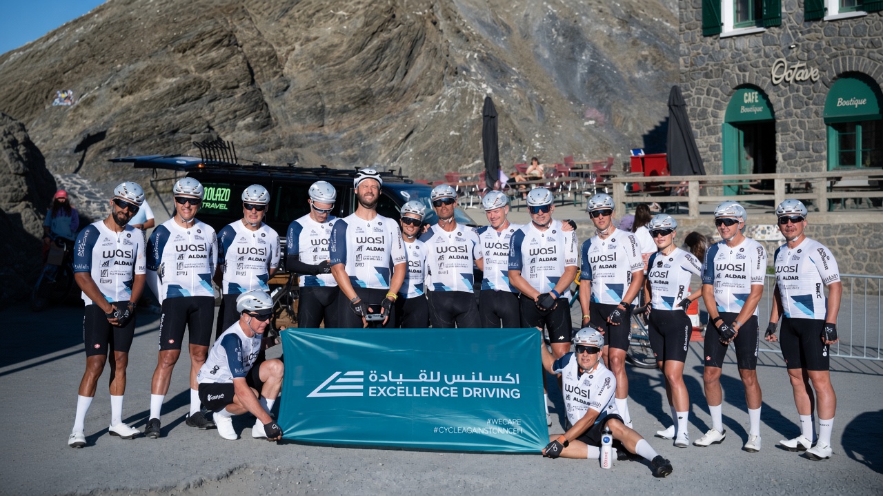 Cycle Against Cancer team with Excellence Driving Center